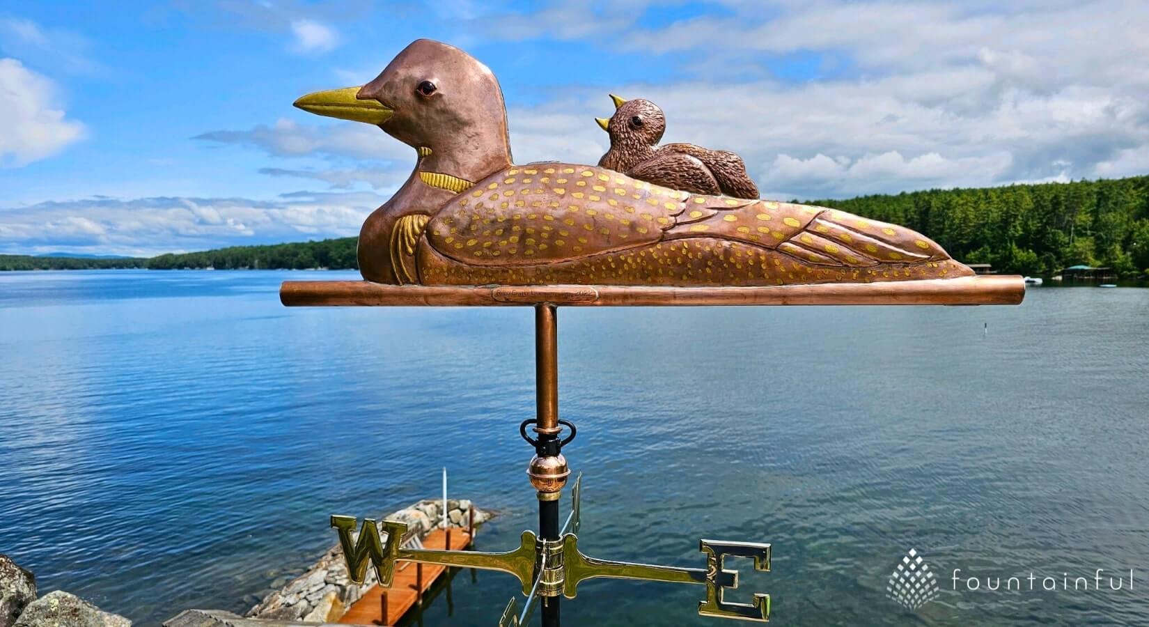 customer weathervane in precious metals by a lake